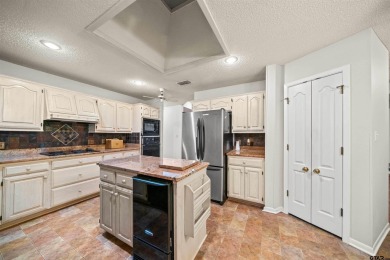 This property at Holly Lake Ranch offers a large covered front on Holly Lake Ranch Golf Club in Texas - for sale on GolfHomes.com, golf home, golf lot