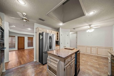 This property at Holly Lake Ranch offers a large covered front on Holly Lake Ranch Golf Club in Texas - for sale on GolfHomes.com, golf home, golf lot