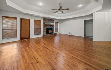 This property at Holly Lake Ranch offers a large covered front on Holly Lake Ranch Golf Club in Texas - for sale on GolfHomes.com, golf home, golf lot