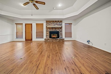 This property at Holly Lake Ranch offers a large covered front on Holly Lake Ranch Golf Club in Texas - for sale on GolfHomes.com, golf home, golf lot