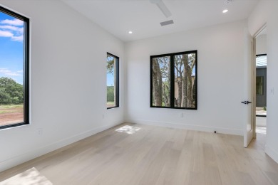 Single level residence with a ton of natural light located on on Summit Rock Golf Course in Texas - for sale on GolfHomes.com, golf home, golf lot