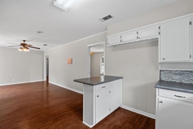 Discover this charming 3-bedroom, 2-bath home with 1,576 sq. ft on Pecan Valley Municipal Golf Course in Texas - for sale on GolfHomes.com, golf home, golf lot