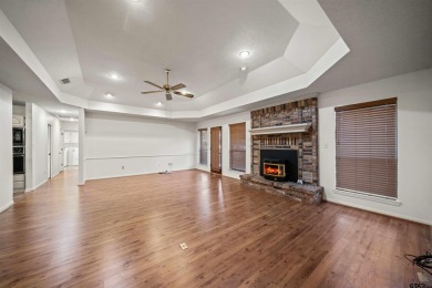 This property at Holly Lake Ranch offers a large covered front on Holly Lake Ranch Golf Club in Texas - for sale on GolfHomes.com, golf home, golf lot