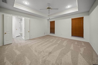 This property at Holly Lake Ranch offers a large covered front on Holly Lake Ranch Golf Club in Texas - for sale on GolfHomes.com, golf home, golf lot
