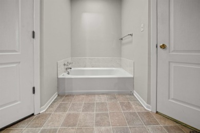 This property at Holly Lake Ranch offers a large covered front on Holly Lake Ranch Golf Club in Texas - for sale on GolfHomes.com, golf home, golf lot