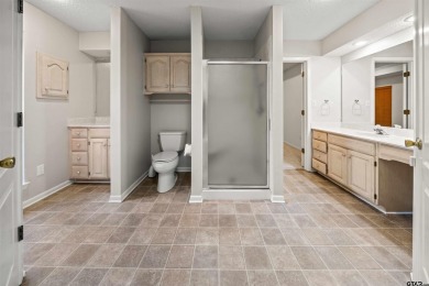 This property at Holly Lake Ranch offers a large covered front on Holly Lake Ranch Golf Club in Texas - for sale on GolfHomes.com, golf home, golf lot