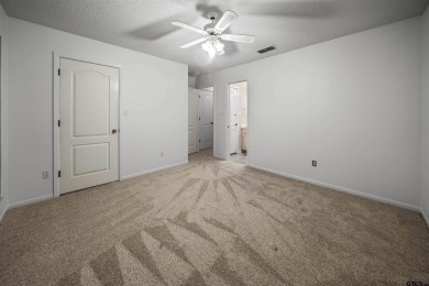This property at Holly Lake Ranch offers a large covered front on Holly Lake Ranch Golf Club in Texas - for sale on GolfHomes.com, golf home, golf lot
