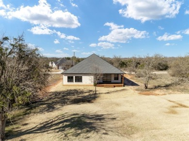 Luxury and tranquility in this 3 bedroom, 2.5 bath masterpiece on White Bluff Resort - New Course in Texas - for sale on GolfHomes.com, golf home, golf lot