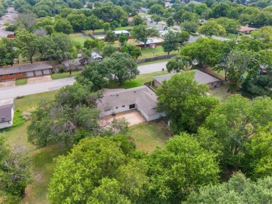 Discover this charming 3-bedroom, 2-bath home with 1,576 sq. ft on Pecan Valley Municipal Golf Course in Texas - for sale on GolfHomes.com, golf home, golf lot