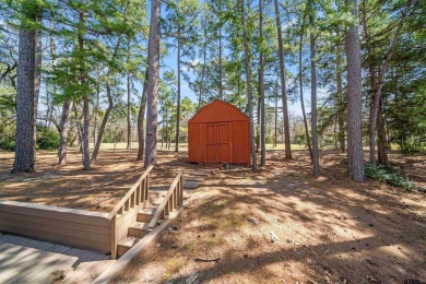 This property at Holly Lake Ranch offers a large covered front on Holly Lake Ranch Golf Club in Texas - for sale on GolfHomes.com, golf home, golf lot