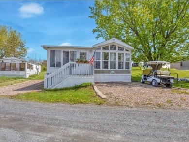 Welcome to this very cute and stylish 1-bedroom seasonal cottage on Apple Island Golf Course At Apple Island Resort in Vermont - for sale on GolfHomes.com, golf home, golf lot