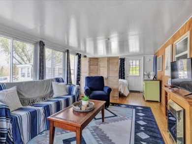 Welcome to this very cute and stylish 1-bedroom seasonal cottage on Apple Island Golf Course At Apple Island Resort in Vermont - for sale on GolfHomes.com, golf home, golf lot