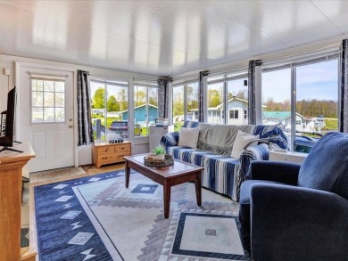 Welcome to this very cute and stylish 1-bedroom seasonal cottage on Apple Island Golf Course At Apple Island Resort in Vermont - for sale on GolfHomes.com, golf home, golf lot