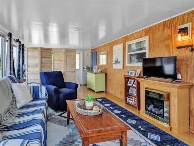 Welcome to this very cute and stylish 1-bedroom seasonal cottage on Apple Island Golf Course At Apple Island Resort in Vermont - for sale on GolfHomes.com, golf home, golf lot