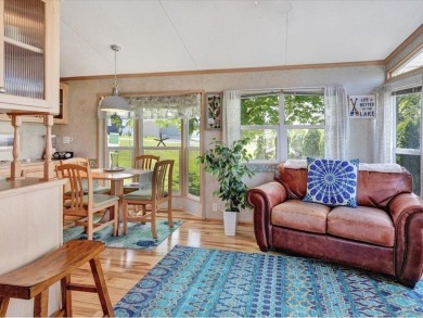 Welcome to this very cute and stylish 1-bedroom seasonal cottage on Apple Island Golf Course At Apple Island Resort in Vermont - for sale on GolfHomes.com, golf home, golf lot