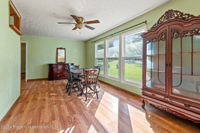 There's room for all the family with this 4 bedroom/2 bathroom on Brooksville Country Club At Majestic Oaks in Florida - for sale on GolfHomes.com, golf home, golf lot