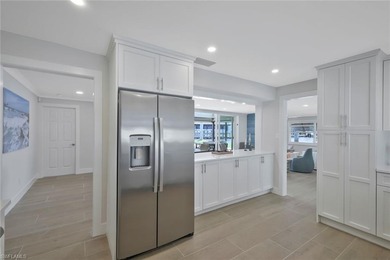 Coastal Waterfront Retreat with Panoramic Estero Bay Views & on Fort Myers Beach and Golf Club in Florida - for sale on GolfHomes.com, golf home, golf lot