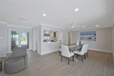Coastal Waterfront Retreat with Panoramic Estero Bay Views & on Fort Myers Beach and Golf Club in Florida - for sale on GolfHomes.com, golf home, golf lot