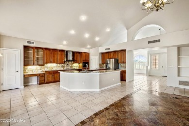 Located in a private setting, this spacious home backs to on El Conquistador Country Club - Conquistador in Arizona - for sale on GolfHomes.com, golf home, golf lot