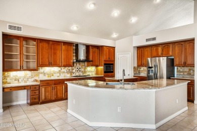 Located in a private setting, this spacious home backs to on El Conquistador Country Club - Conquistador in Arizona - for sale on GolfHomes.com, golf home, golf lot