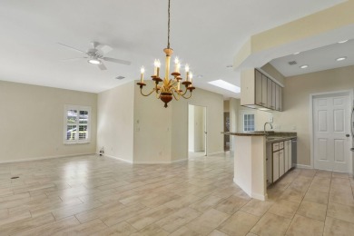 Located on the 10th hole of the Legacy Golf course, this Pine on The Legacy Golf and Tennis Club in Florida - for sale on GolfHomes.com, golf home, golf lot