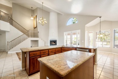 Located in a private setting, this spacious home backs to on El Conquistador Country Club - Conquistador in Arizona - for sale on GolfHomes.com, golf home, golf lot