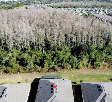 One or more photo(s) has been virtually staged. Outstanding on Stonegate Golf Club in Florida - for sale on GolfHomes.com, golf home, golf lot