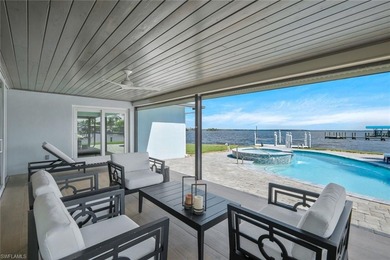 Coastal Waterfront Retreat with Panoramic Estero Bay Views & on Fort Myers Beach and Golf Club in Florida - for sale on GolfHomes.com, golf home, golf lot
