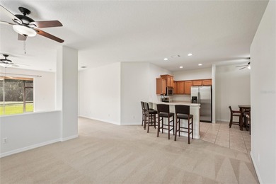 Experience serene lake and golf course views from this beautiful on River Strand Golf and Country Club At Heritage Harbour  in Florida - for sale on GolfHomes.com, golf home, golf lot