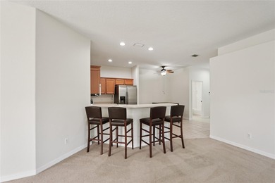 Experience serene lake and golf course views from this beautiful on River Strand Golf and Country Club At Heritage Harbour  in Florida - for sale on GolfHomes.com, golf home, golf lot