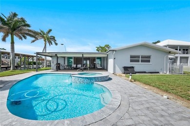 Coastal Waterfront Retreat with Panoramic Estero Bay Views & on Fort Myers Beach and Golf Club in Florida - for sale on GolfHomes.com, golf home, golf lot