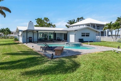 Coastal Waterfront Retreat with Panoramic Estero Bay Views & on Fort Myers Beach and Golf Club in Florida - for sale on GolfHomes.com, golf home, golf lot