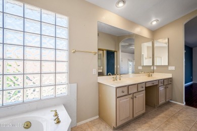 Located in a private setting, this spacious home backs to on El Conquistador Country Club - Conquistador in Arizona - for sale on GolfHomes.com, golf home, golf lot