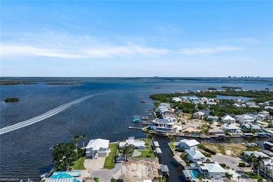Coastal Waterfront Retreat with Panoramic Estero Bay Views & on Fort Myers Beach and Golf Club in Florida - for sale on GolfHomes.com, golf home, golf lot