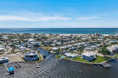 Coastal Waterfront Retreat with Panoramic Estero Bay Views & on Fort Myers Beach and Golf Club in Florida - for sale on GolfHomes.com, golf home, golf lot