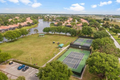 Located on the 10th hole of the Legacy Golf course, this Pine on The Legacy Golf and Tennis Club in Florida - for sale on GolfHomes.com, golf home, golf lot