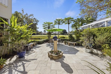 Spacious and living, situated on the 14th fairway of PGA's on PGA National Golf Club in Florida - for sale on GolfHomes.com, golf home, golf lot