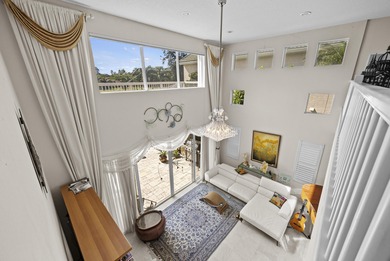 Spacious and living, situated on the 14th fairway of PGA's on PGA National Golf Club in Florida - for sale on GolfHomes.com, golf home, golf lot