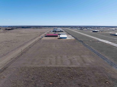 Take a look at this airport hangar lot that sits right off of on River Falls Par 3 Golf Course and Air Park in Texas - for sale on GolfHomes.com, golf home, golf lot