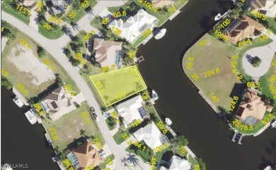 Building lot with beautiful views of intersecting canals in the on Saint Andrews South Golf Club in Florida - for sale on GolfHomes.com, golf home, golf lot
