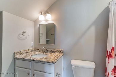 Prime location meets stunning lake views! This beautifully on Beacon Ridge Golf and Country Club in North Carolina - for sale on GolfHomes.com, golf home, golf lot