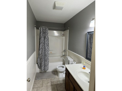 This cozy 3 bed 1.5 bath home is in a quiet neighborhood on a on Russellville Country Club in Arkansas - for sale on GolfHomes.com, golf home, golf lot