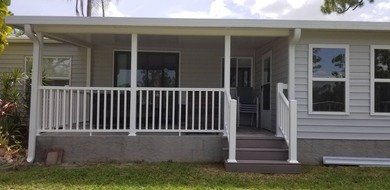 Stunning, move-in-ready manufactured home on leased land-nothing on Pine Lakes Country Club in Florida - for sale on GolfHomes.com, golf home, golf lot