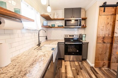 Slow down and enjoy the good with this ideal getaway or on Nocona Hills Golf Course in Texas - for sale on GolfHomes.com, golf home, golf lot