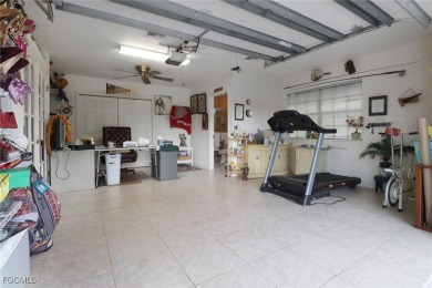 Discover this exceptional 3-bedroom, 2.5-bath home on an on Fiddlesticks Country Club in Florida - for sale on GolfHomes.com, golf home, golf lot