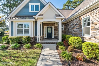 Elegant upgrades and thoughtful design define this like-new on Sea Trail Golf Resort in North Carolina - for sale on GolfHomes.com, golf home, golf lot