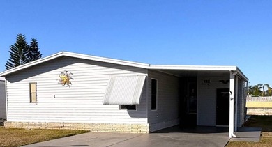 Discover your slice of paradise in this beautifully maintained on Sabal Springs Golf and Racquet Club in Florida - for sale on GolfHomes.com, golf home, golf lot