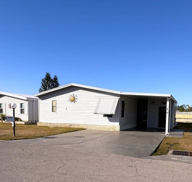 Discover your slice of paradise in this beautifully maintained on Sabal Springs Golf and Racquet Club in Florida - for sale on GolfHomes.com, golf home, golf lot