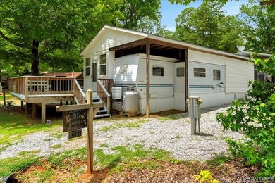 Back on the market, this charming 3 bedroom 1 bath 1999 camper on River Ridge Golf Club in Virginia - for sale on GolfHomes.com, golf home, golf lot
