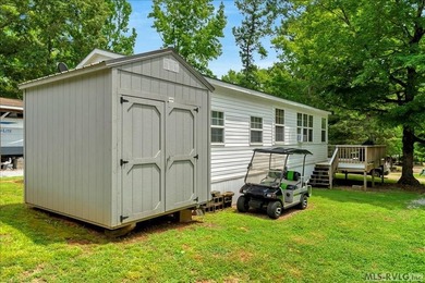 Back on the market, this charming 3 bedroom 1 bath 1999 camper on River Ridge Golf Club in Virginia - for sale on GolfHomes.com, golf home, golf lot